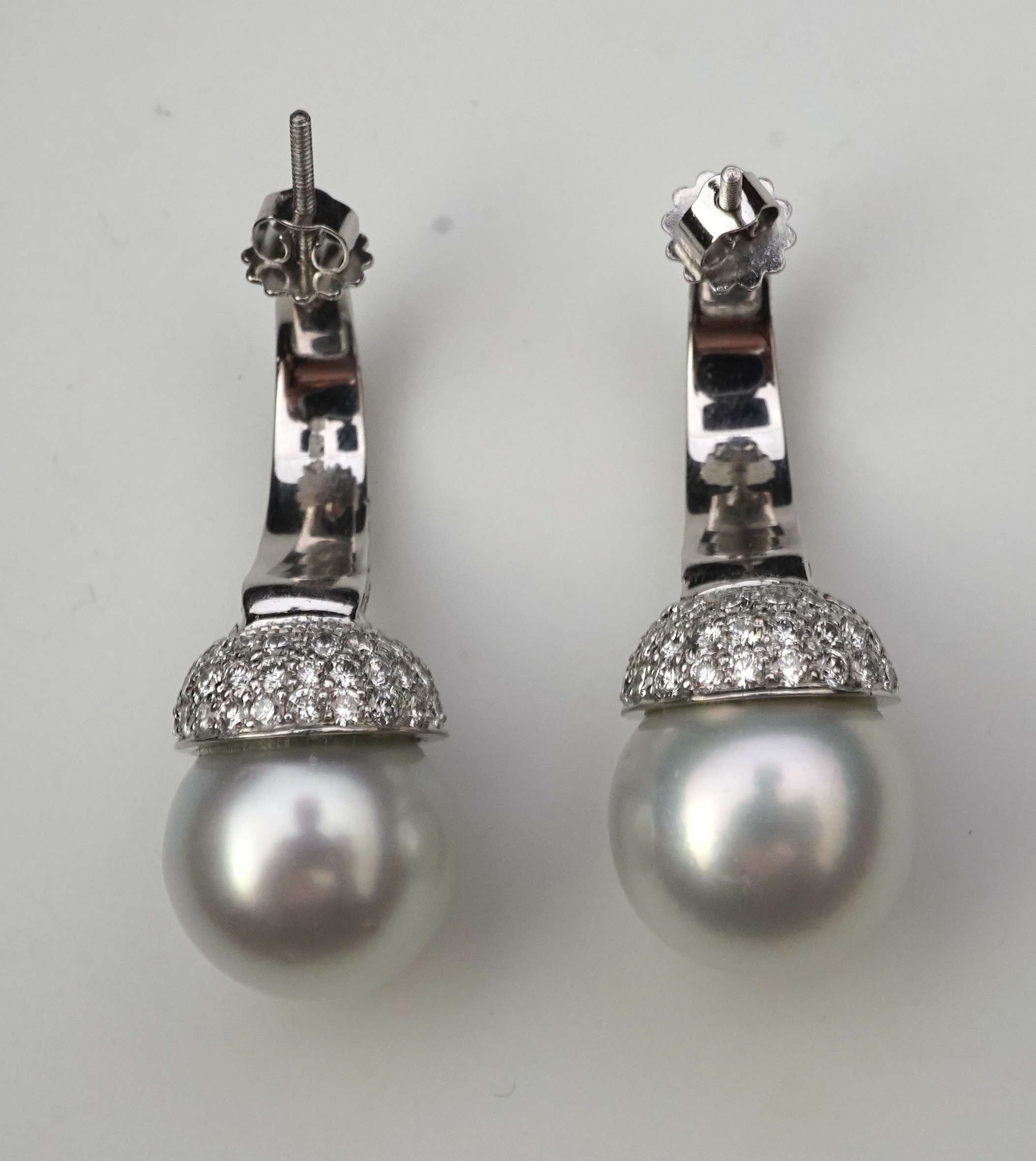 A pair of South Sea cultured pearl and diamond earrings